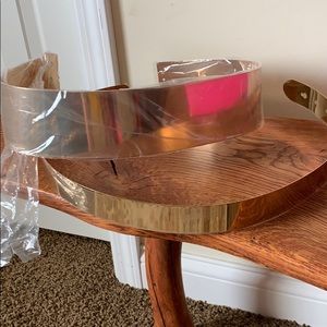 Two gold dress belts